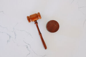 a wooden gavel lying on a table