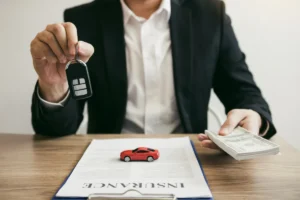 man holding car keys