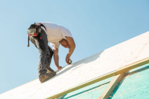 a roofer working