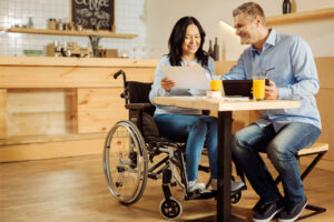 someone in a wheelchair eating lunch